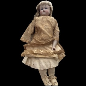 Early Solid Dome German Bisque Closed Mouth Shoulderhead Doll with chunky Leather Body