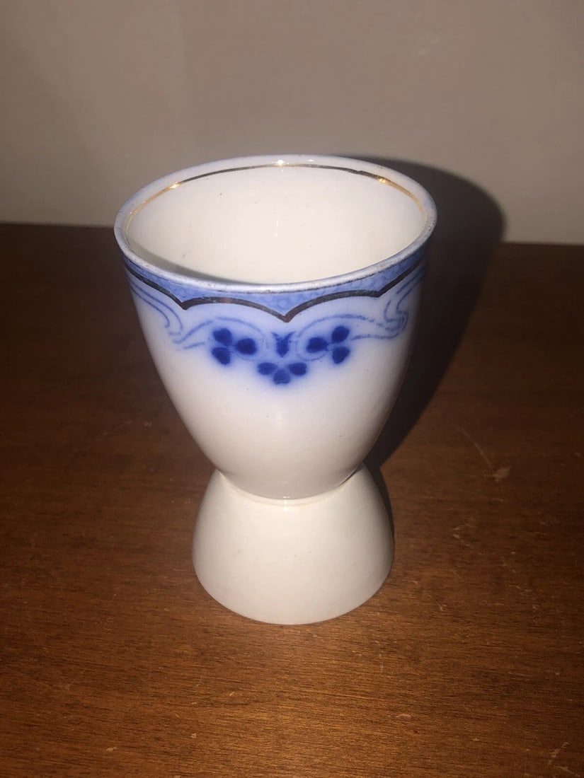 Idris Flow Blue Egg Cup: It measures 3 5/8” x 2 3/8” and dates around the 1860’s. It has a little flake on the bottom rim. Otherwise it has no other issues Shipping: Domestic: Flat-rate of $10.00 to anywhere