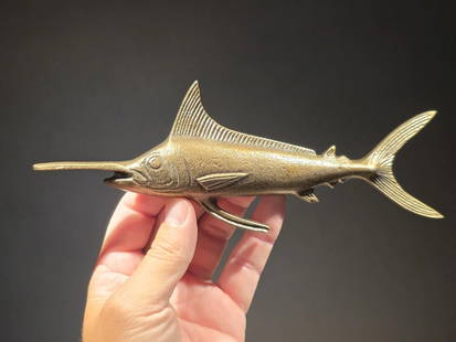 8 3/4" Swordfish Fish Letter Opener: – 8-3/4″ L x 3-1/2″ W x 1″ H – Weighs 5 oz Reproduction Vintage-style swordfish paperweight, crafted from lightweight aluminum with an antiqued brass finish. Perfect as a