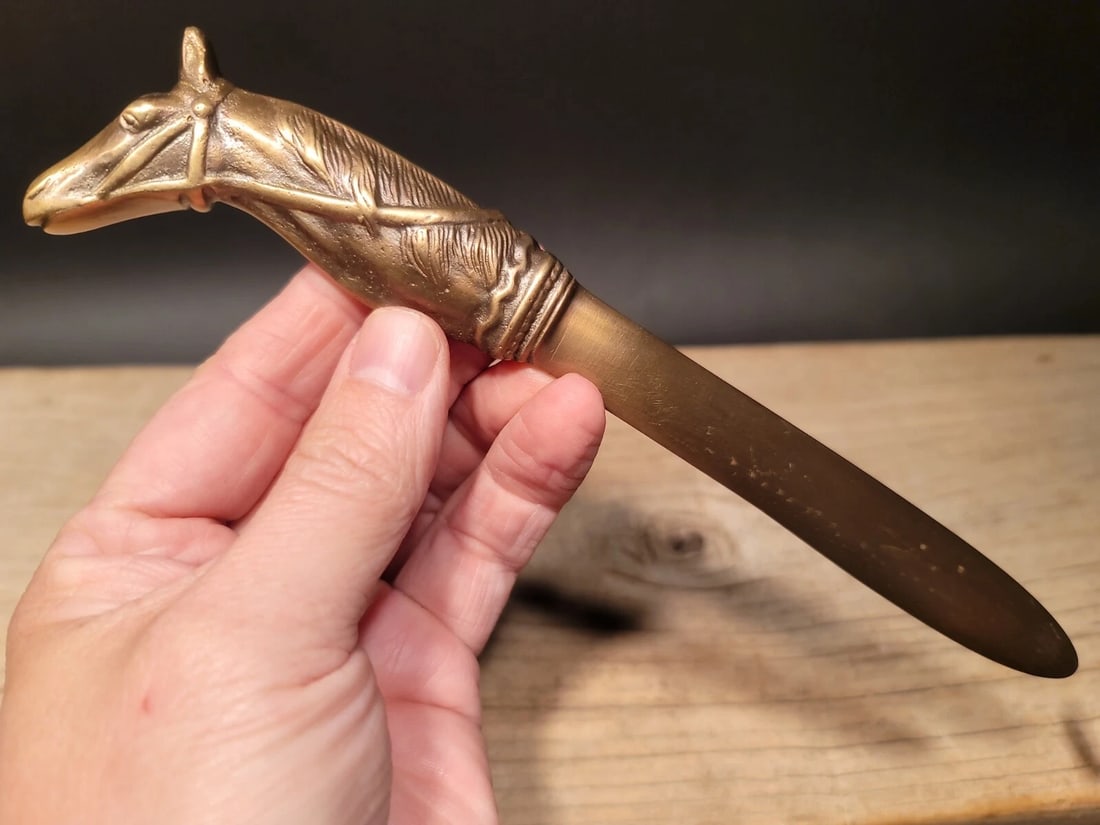 Brass Horse letter opener Equestrian Desk Collectible: Vintage Antique Style Brass Horse letter opener Equestrian Desk Collectible Description 6 1/2" long x 1 1/2" Wide Wonderful reproduction solid brass horse bust letter opener. Great for use or display