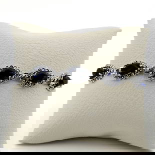 925 Silver Ladies Bracelet with Blue Zircons and Marcasite: Title: 925 Silver Ladies Bracelet with Blue Zircons and Marcasite Description: 925 Silver Ladies Bracelet with Blue Zircons and Marcasite -Condition:New Weight:19.6g -Size:7.67 in (19.5cm) Link Width: