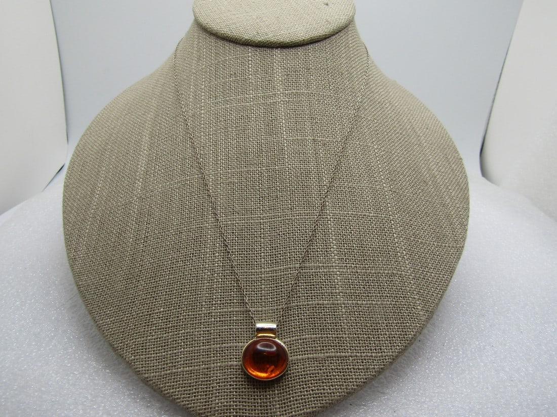 Vintage Sterling Amber Necklace, 18", 1980's-1990's, Signed: Vintage Sterling Amber Necklace, 18", 1980's-1990's, Signed and marked .925/SU and Thailand. It tests as sterling with a weight of appx. 2.62 gr. The pendant has a wide bail that has an opening that i