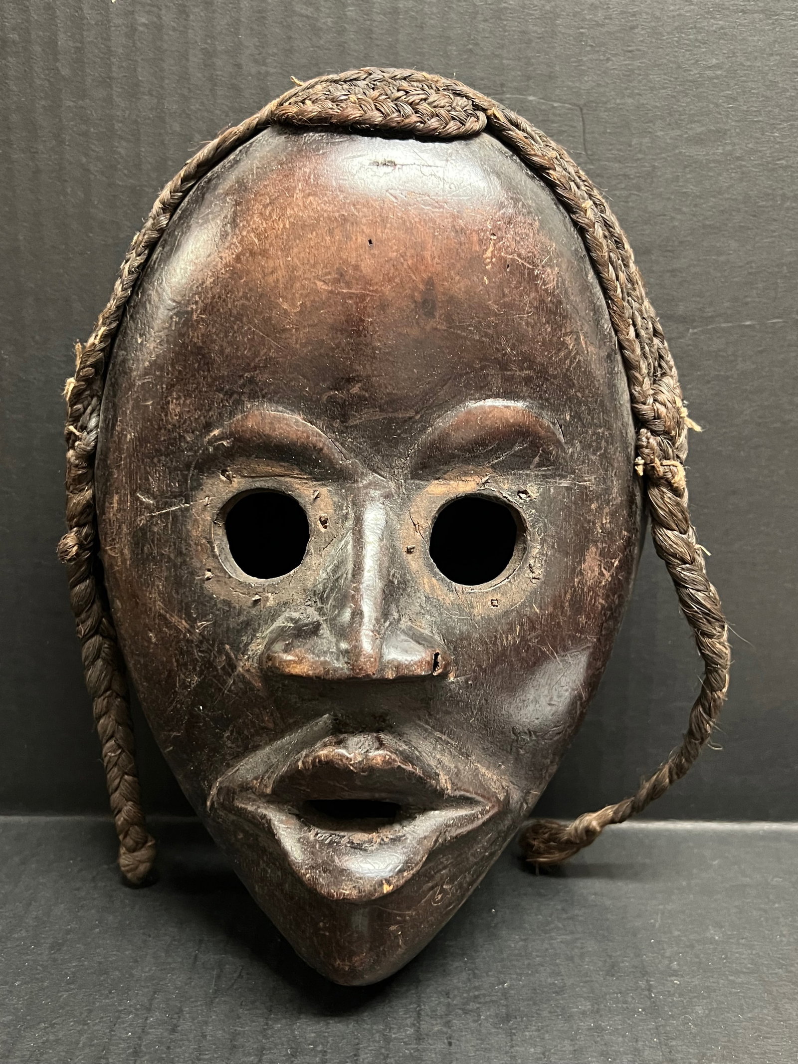 Dan Mask: Title: Dan Mask Date/Period: Late 20th Century Dimension: 12" h x 6" w Material: Wood Additional Information: African Tribal Art Dan Mask Reserve: $150.00 Shipping: Domestic: Flat-rate of $30.00 to an