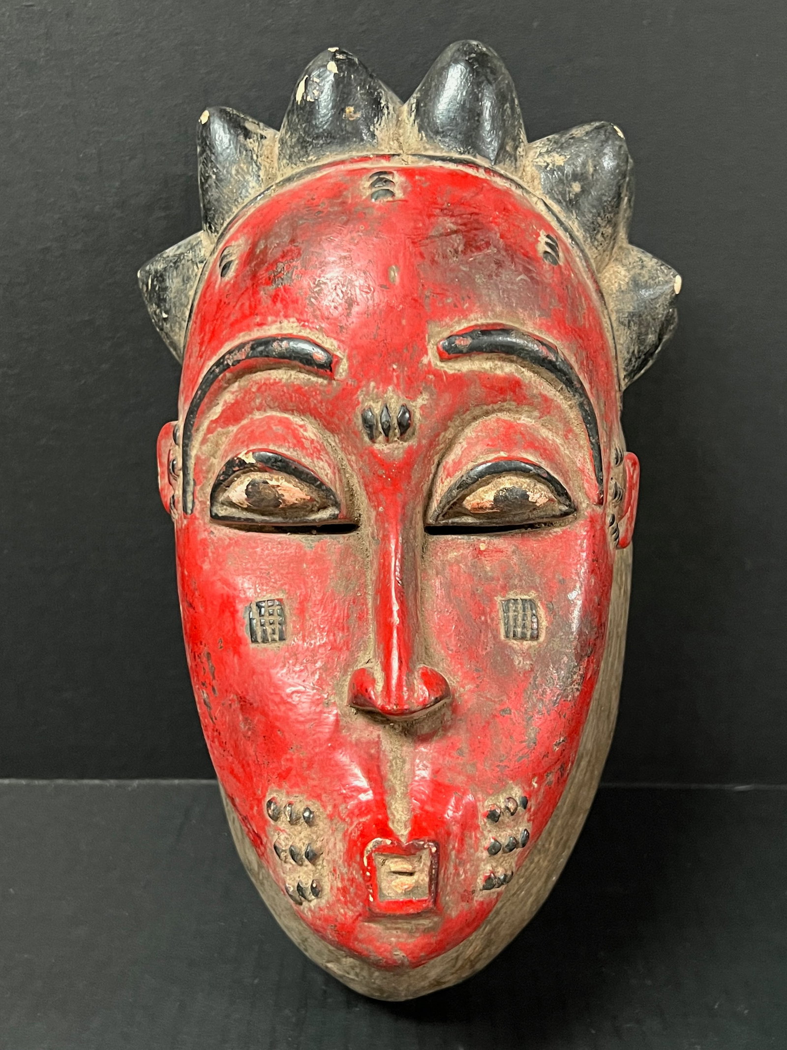 Baule Mask: Title: Baule Mask Date/Period: Late 20th Century Dimension: 14" h x 8" w Material: Wood Additional Information: African Tribal Art Baule Mask Reserve: $80.00 Shipping: Domestic: Flat-rate of $40.00 to