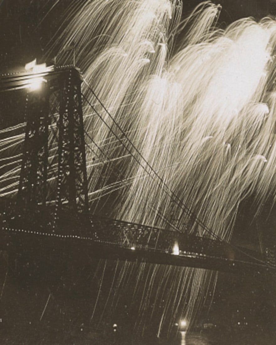 1903, RAIN OF FIRE; CELEBRATED OPENING OF WILLIAMSBURG SUSPENSION BRIDGE, NY.: Title: 1903, RAIN OF FIRE; CELEBRATED OPENING OF WILLIAMSBURG SUSPENSION BRIDGE, NY. Artist/Source: American Stereoscopic Company. Original Date: SEE TITLE Dimensions: 8x10 Description: || UNITED STAT