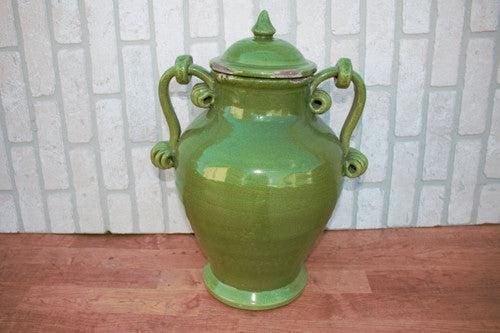 Vintage Ceramic Green Amphora Shaped Vase with Removable Lid: Vintage Ceramic Green Amphora Shaped Vase with Removable Lid Add elegance to your home with this charming amphora shaped vase. Painted with a rustic bright green glaze, this piece is perfect for addin