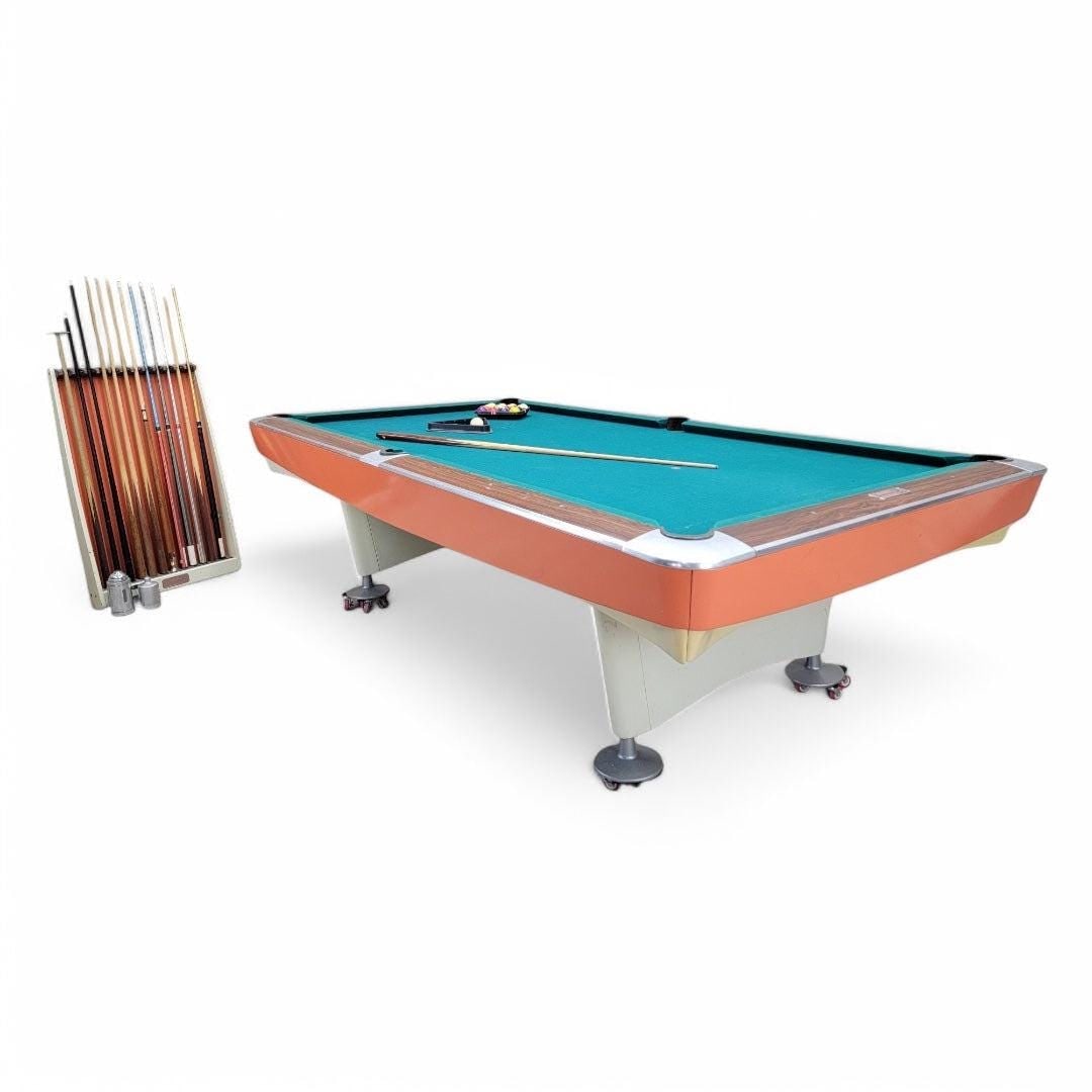 Vintage Brunswick Pool Table with Accessories: intage Brunswick Pool Table with Accessories This vintage Brunswick pool table from the 1960s is a timeless addition to any game room, showcasing classic craftsmanship and enduring style. Included wit