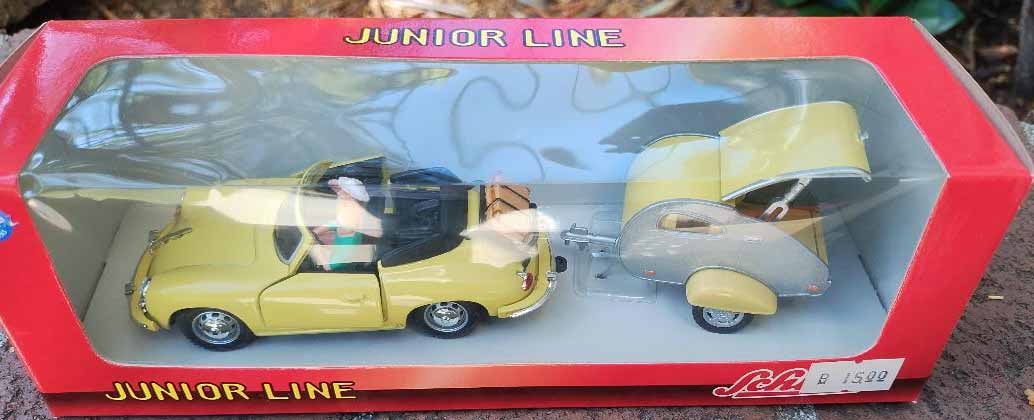 Schuco Junior Porsche and trailer,c10.: Schuco Junior Porsche and trailer,c10. Reserve: $35.00 Shipping: Domestic: Flat-rate of $15.00 to anywhere within the contiguous U.S. International: Foreign shipping rates are determined by destinatio