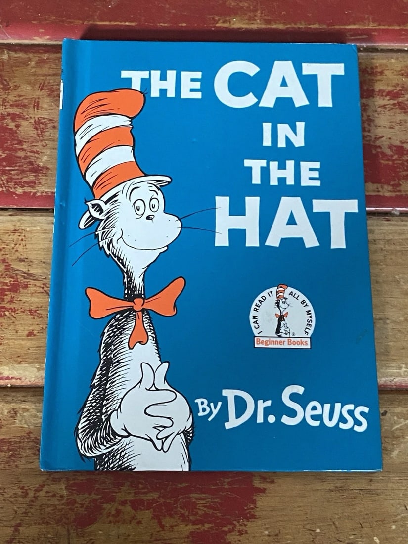 THE CAT IN THE HAT By Dr. Seuss Beginner Books Book Club Edition 1957/1985 VGood: Dive into the whimsical world of "The Cat in the Hat" by Dr. Seuss, a cherished piece from the renowned Beginner Books series. Published in 1958 and reissued in 1985 for the Grolier Book Club Edition,