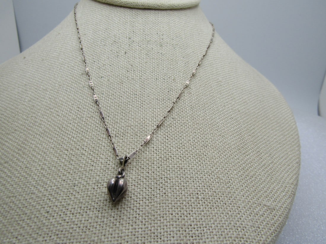 Vintage Sterling Heart Fob Necklace, 16", 1970's-1980's: Vintage Sterling Heart Fob Necklace, 16", 1970's-1980's. The pendant is a 3-D design and appears to be a four-sided heart - no matter how you turn it - it is a heart shake. Fob like drop. The pendant 