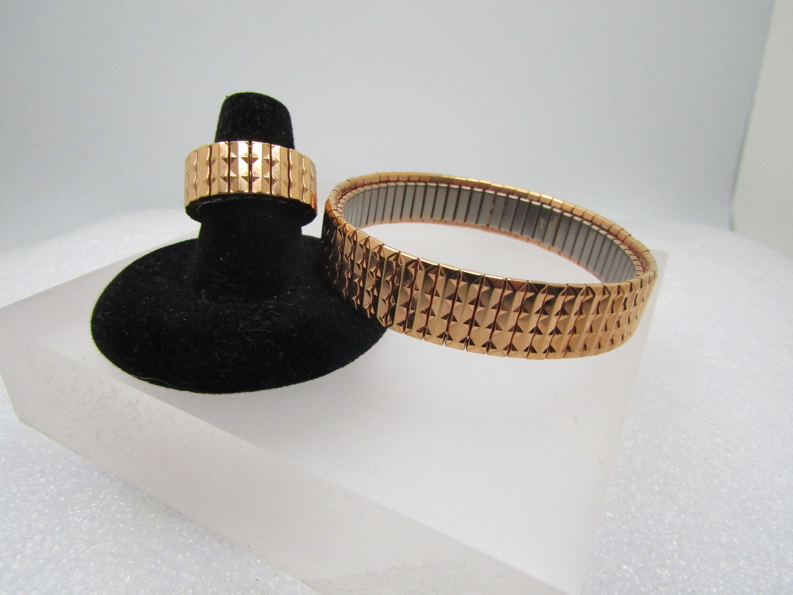 Vintage Speidel Rose Gold Tone Stretch Bracelet/Ring, Stainless Steel Base, 1990's: Vintage Speidel Rose Gold Tone Stretch Bracelet/Ring, Stainless Steel Base, 1990's. The bracelet is appx. 7" at rest but will expand to 8.5" and slightly higher. It is appx. 12mm wide with inside bein