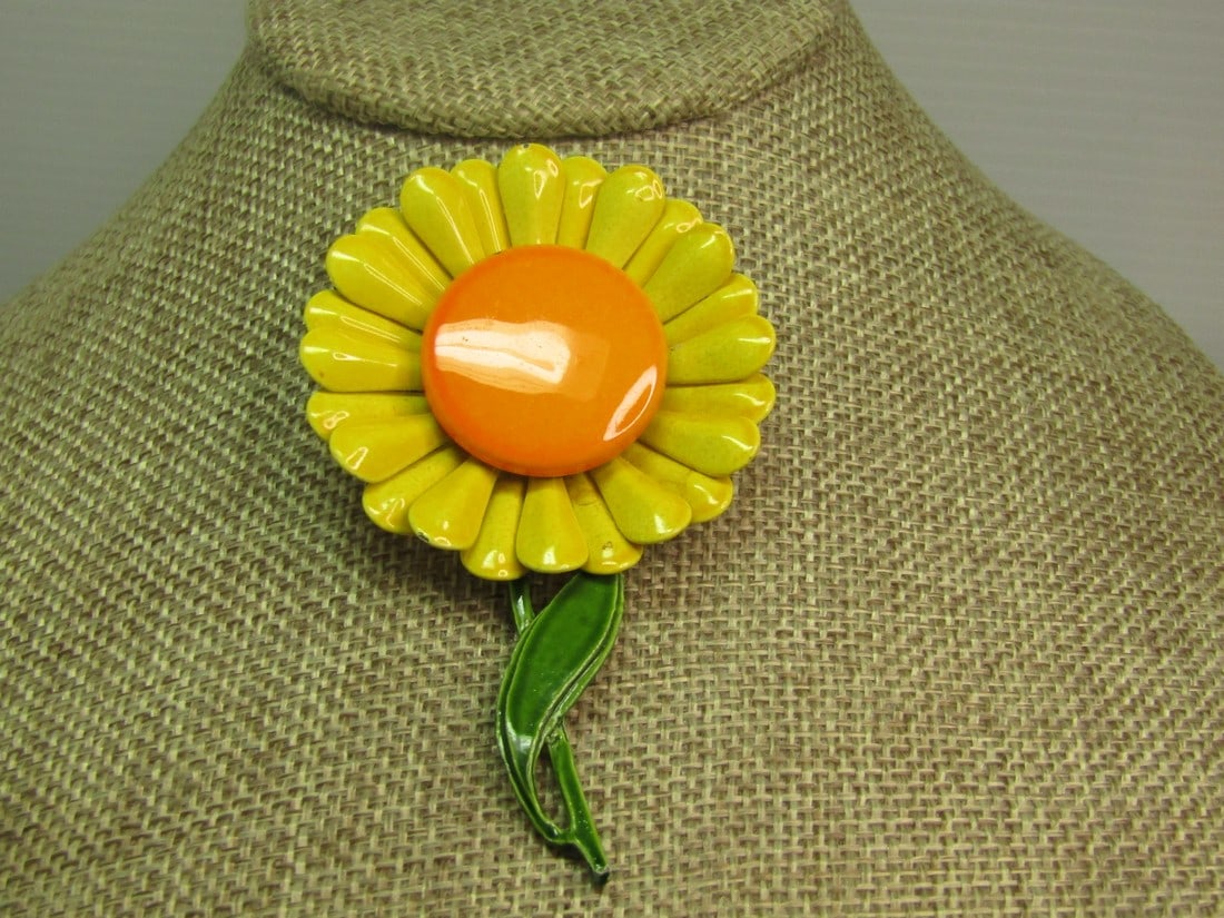 Vintage Enameled Floral Stem Brooch, Daisy/Sunflower, Green/Yellow/Orange, 1960's-1970's: Vintage Enameled Floral Stem Brooch, Daisy/Sunflower, Green/Yellow/Orange, 1960's-1970's. This is appx. 3" tall and 2" wide. The yellow petals are tiered and rounded at the edge and come out from unde