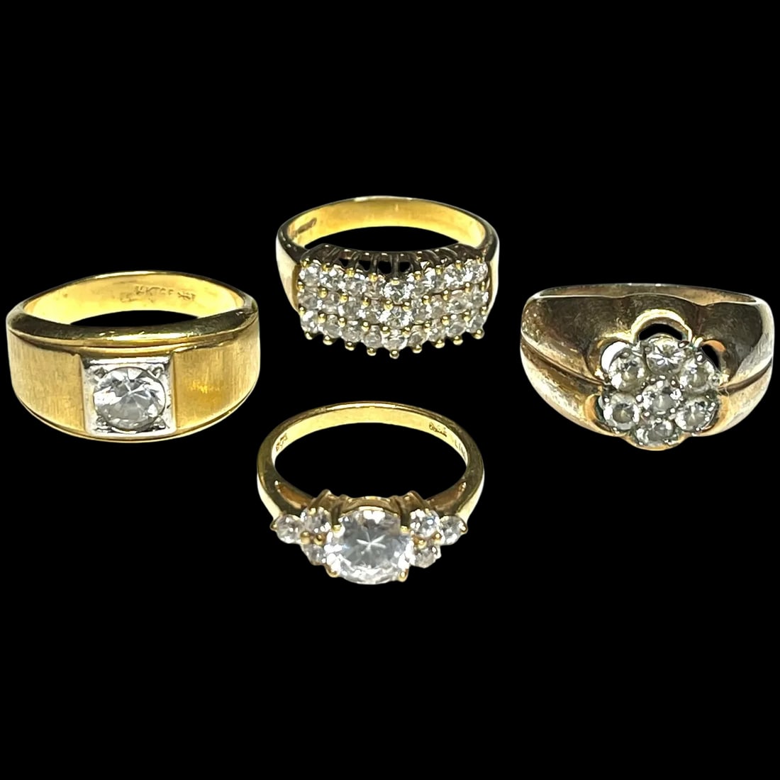 Vintage Lot of Gold Tone Statement Rings: Title: Vintage Lot of Gold Tone Statement Rings Description: Vintage Lot of Gold Tone Statement Rings Engagement RIng Size 5.5 Grams 2.5 14k HGE LIND Three Row Ring Size 8.75 Grams 4.3 14k GF Flower R