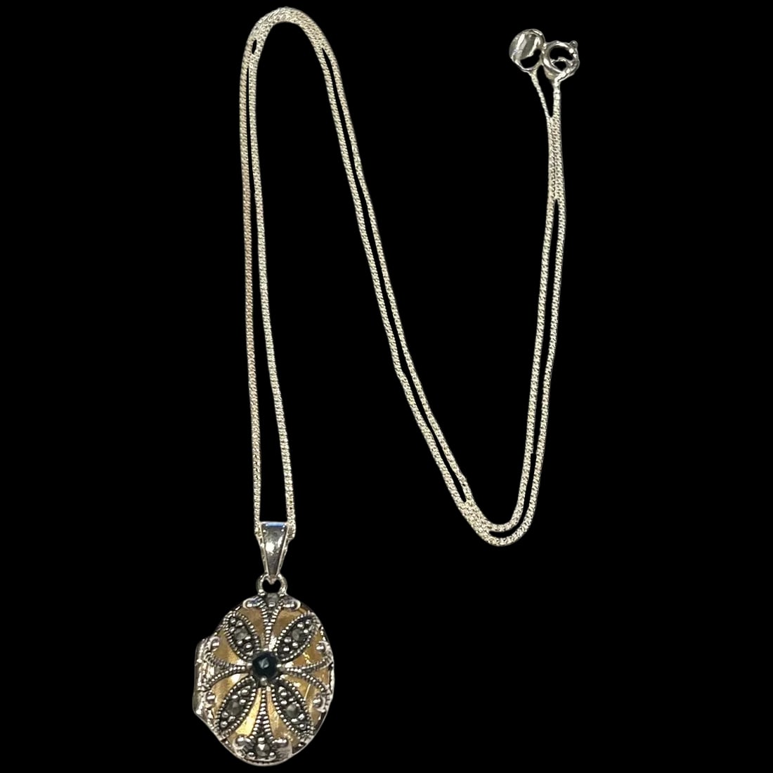 VIntage Sterling Silver, Black Onyx, and Marcasite Locket Necklace: Title: VIntage Sterling Silver, Black Onyx, and Marcasite Locket Necklace Description: VIntage Sterling Silver, Black Onyx, and Marcasite Locket Necklace Hallmarked: 925 Weighs: 6.2 grams Chain Measur
