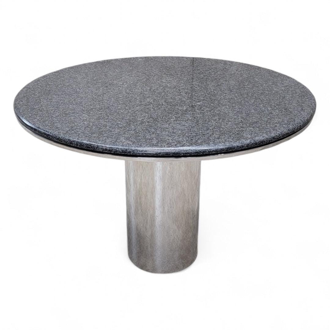 Mid Century Modern Anello Stainless Steel Pedestal Italian Granite Top Table by Brueton: Mid Century Modern Stainless Steel Pedestal Italian Granite Round Top Table by Brueton The Mid Century Modern Stainless Steel Pedestal Table by Brueton features a striking design that combines a sleek