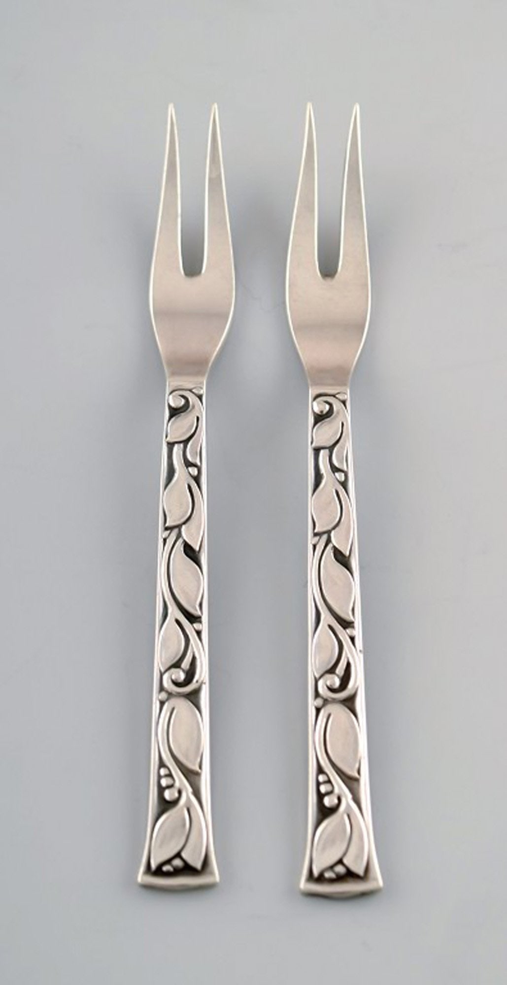 Evald Nielsen No. 30 (leaf pattern), 2 pcs. herring/Cold cut forks in sterling silver.: Title:Evald Nielsen No. 30 (leaf pattern), 2 pcs. herring/Cold cut forks in sterling silver. Description:Evald Nielsen No. 30 (leaf pattern), 2 pcs. herring/Cold cut forks in sterling silver. Measures