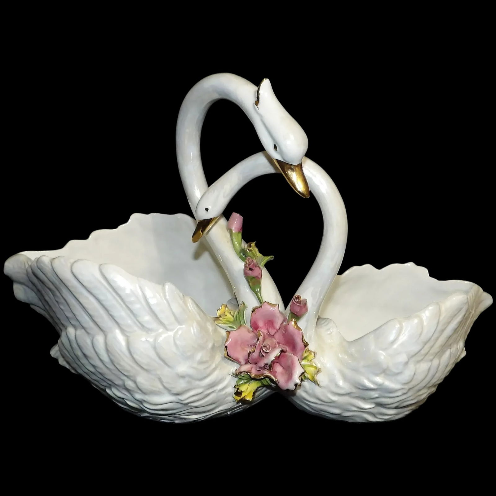 Capodimonte Italy Two Swans Iridescent Porcelain Centerpiece Planter/Vase 1950’s: This Capodimonte Italy Two Swans Iridescent Porcelain Centerpiece Planter/Vase 1950’s is a striking piece. It does have a chipped flower, but it is still a beautiful piece. The damage reduced th