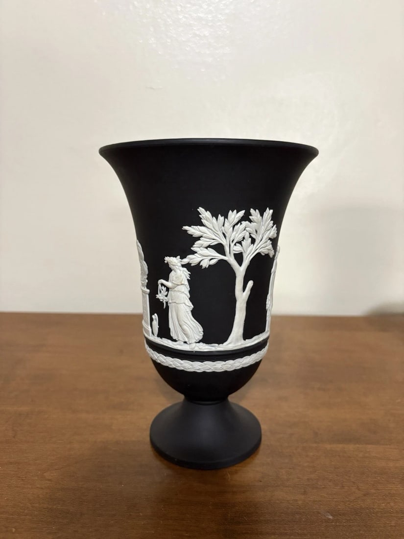 Wedgwood Black Jasperware Vase: It measures 7 1/4” high and is marked. It has no chips, cracks or repairs Shipping: Domestic: Flat-rate of $15.00 to anywhere within the contiguous U.S. International: Foreign shipping rates are