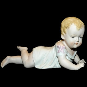 Andrea Bisque Piano Baby Girl with Pink Bow Figurine