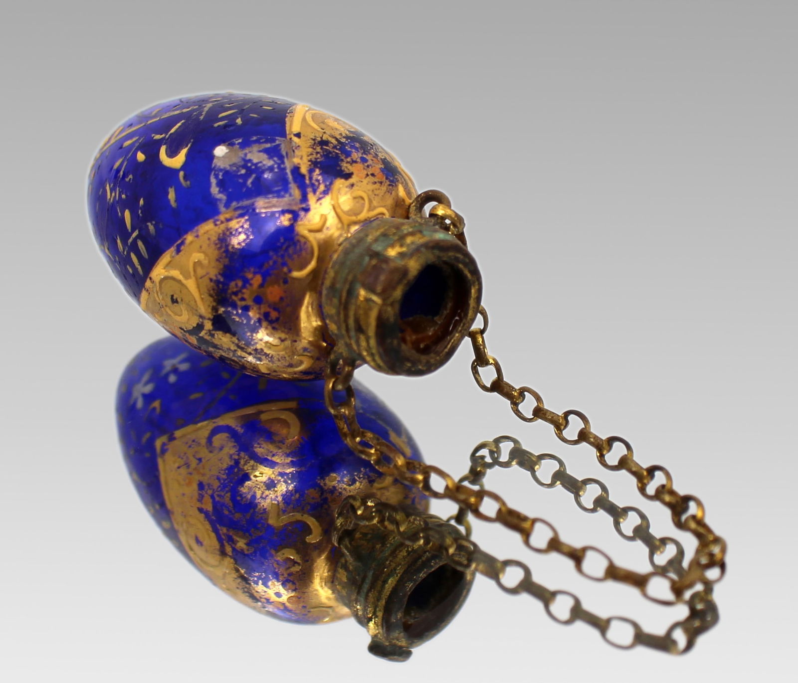 19th c. Bohemian Blue Glass Chatelaine Scent Bottle – Gilded & Enamelled: Title: 19th c. Bohemian Blue Glass Chatelaine Scent Bottle – Gilded & Enamelled Description: 19th c. Bohemian Blue Glass Chatelaine Scent Bottle – Gilded & Enamelled A decorative late 19th