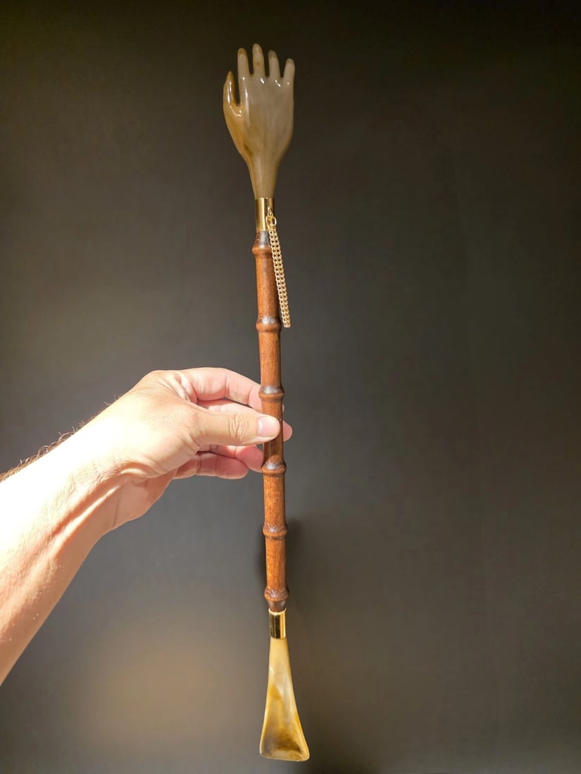 21" Wood Carved Shoe Horn Back Scratcher: 21" Wonderful reproduction combination shoe-horn and back scratcher, Originals likely dated back to the mid-20th century. It features a design that incorporates a hand shaped back scratcher at one end