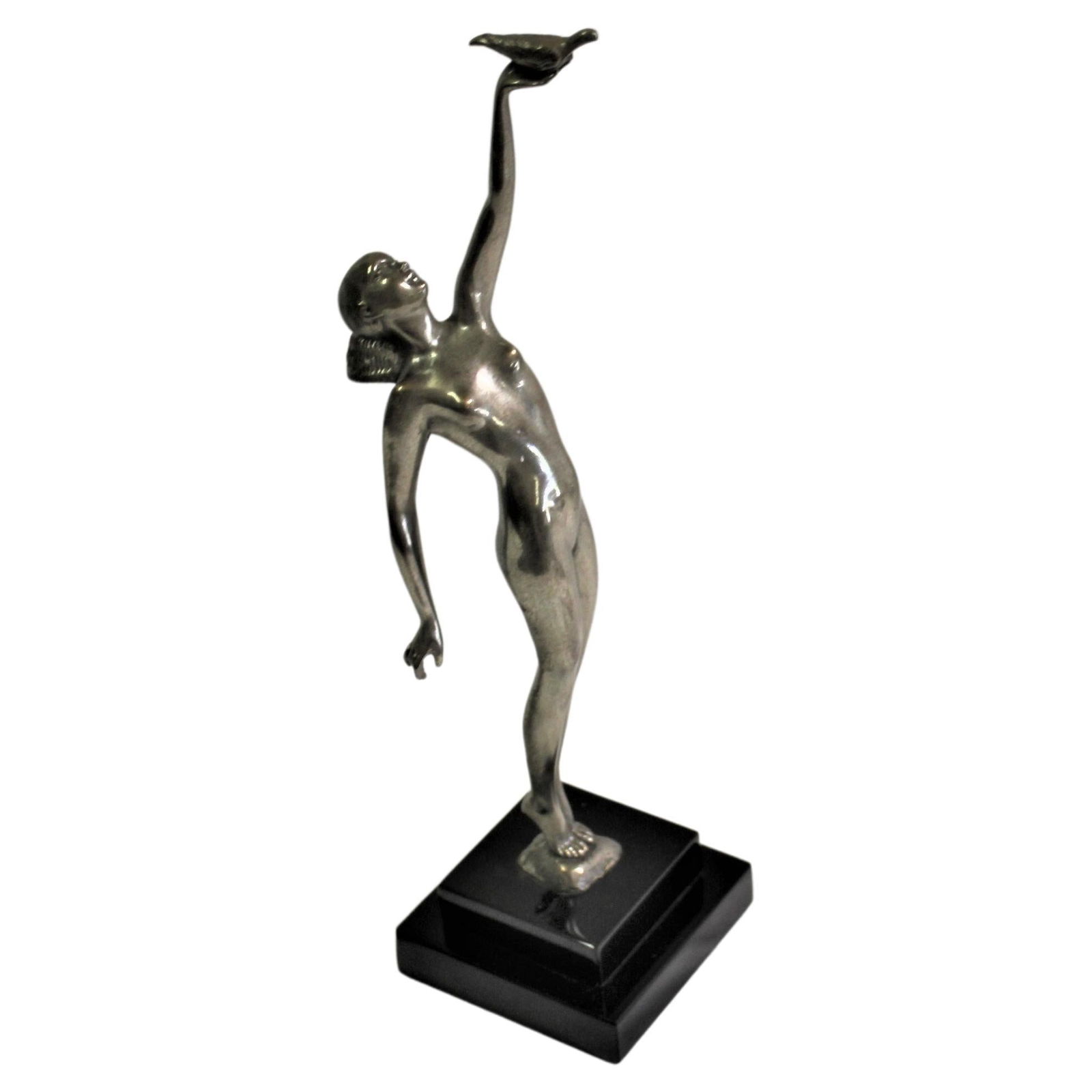Messenger of Peace, Deco / Modern, Female: A hi-quality bronze casting in lost wax method with a polished Antique Silver patina . She is in a graceful pose holding a Pigeon in her left hand and up on her tippy toes. All mounted on an absolute