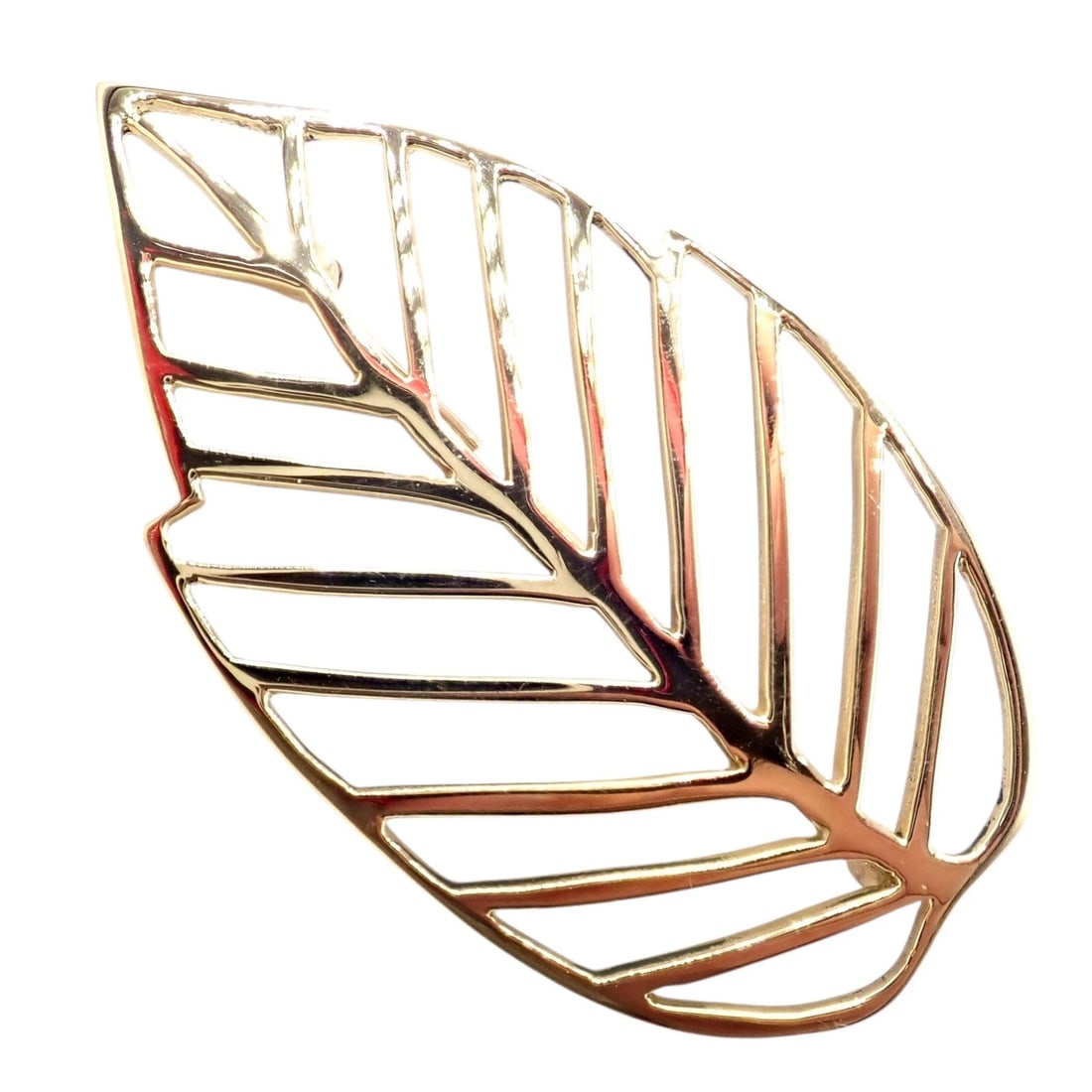 Authentic! Tiffany & Co Angela Cummings 18k Yellow Gold Leaf Pin Brooch 1981: Authentic Tiffany & Co. Angela Cummings 1981 brooch crafted in luxurious 18k yellow gold. This exquisite leaf pin features an openwork design that captures natural elegance with timeless sophisticatio