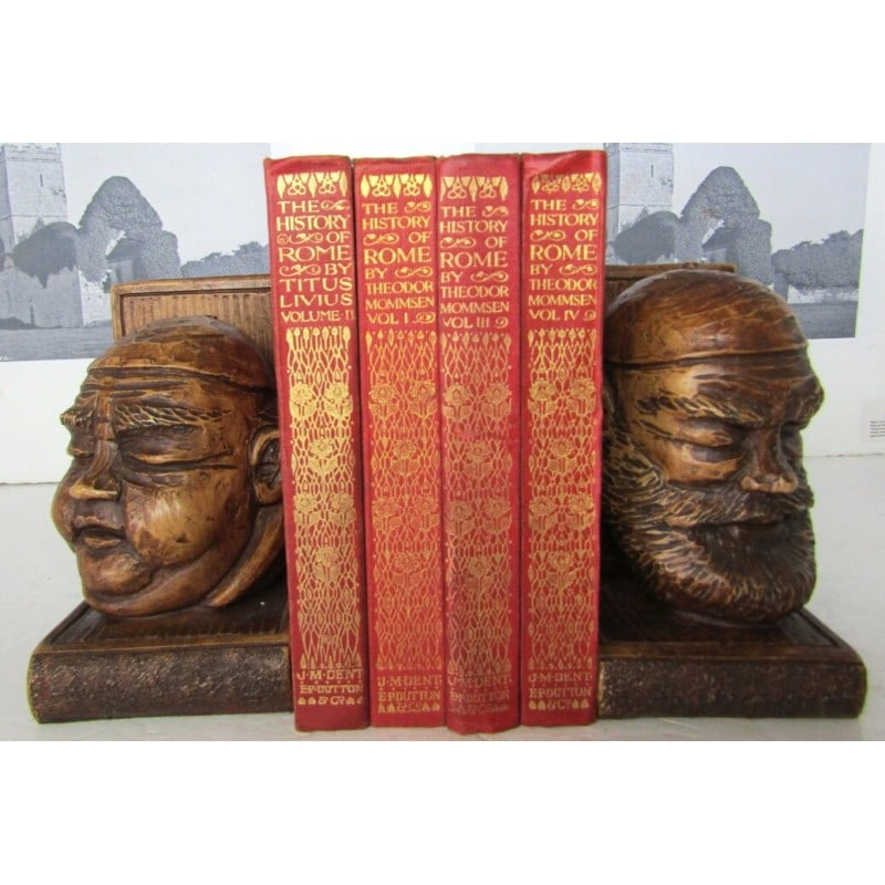 The History of Rome. 4 Volumes: Everyman's Library series, edited by Ernest Rhys. Four volumes complete. Publishers red cloth with blind-stamped vignette. Gilt title and gilt vignette to spine. Pictorial endpapers. Decorative title.