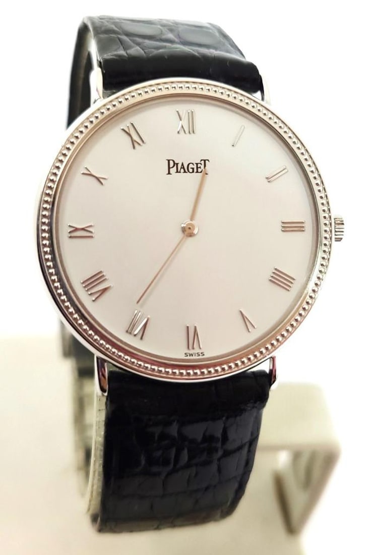Solid 18k White PIAGET Unisex Watch Ref 80231 with 18k Whie Gold Buckle* EXLNT: Solid 18k White PIAGET Unisex Watch Ref 80231 with 18k Whie Gold Buckle* EXLNT???? This Unisex PIAGET? watch is Swiss made. Great present for yourself or someone you love! * Solid 18k white gold case