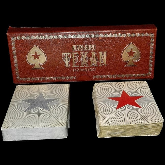 Vintage Marlboro Texan #45 Poker Cards in Case: This Vintage Marlboro Texas #45 Poker Cards in Case has one deck that has never been opened. Case is in excellent condition. These cards are replicas of the late 1800’s cards produced by Russel & Mo