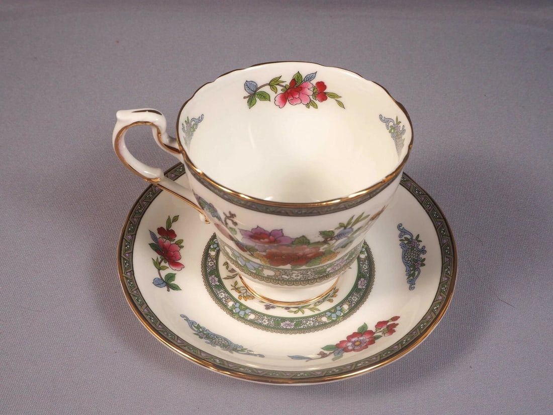 Royal Paragon Tree of Kashmir Tea Coffee cup Saucer Bone China England: This is one exceptional set of 1 Coffee/Tea cup and 1 saucer, made by Royal Paragon, England. The set is in the famous Tree of Kashmir pattern. The pattern includes exotic tree and vase with vibrant f