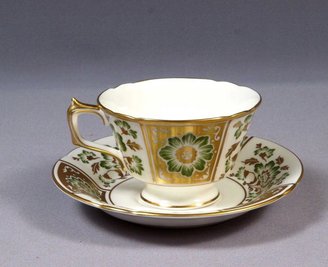 Royal Crown Derby Green DERBY PANEL Coffee Tea cup Saucer Set England: This is one gorgeous Set of Coffee/Tea Cup and Saucer by Royal Crown Derby - Made in England. The set is in DERBY PANEL Green pattern. It has gold and green flowers and panels. The set is properly mar
