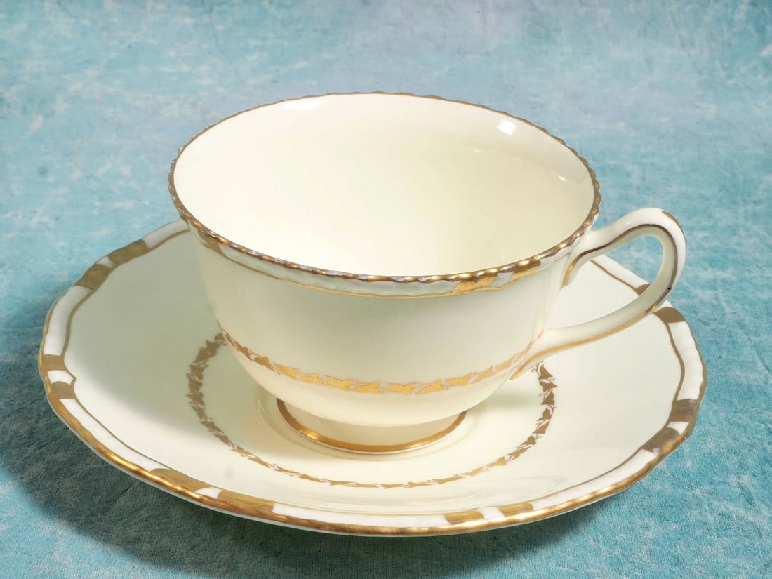 Royal Doulton VINTAGE Tea Coffee CUP Saucer Gold Encrusted edges Cream 1938: This is a gorgeous set of Coffee/Tea cup and Saucer from Royal Doulton, Made in England. This pattern has been discontinued, it was an old, antique pattern, originally manufactured in 1938 and 1939, a
