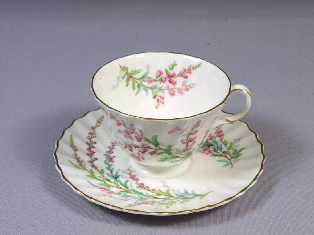 Artist Signed Royal Doulton BELL HEATHER PLACE Coffee Tea cup Saucer Set: This is a gorgeous Bone china Coffee/Teacup and Saucer set, from the Bell Heather (H4927) pattern by Royal Doulton, Made in England. This pattern has been discontinued, it was originally manufactured