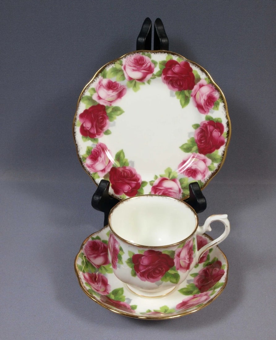 Royal Albert OLD ENGLISH ROSE Dessert Plate Coffee Tea Cup Saucer Trio Setting: This is a gorgeous TRIO set of Dessert/Salad Plate, Cup and Saucer. The set is made by Royal Albert in England in Old English Rose pattern. It is properly marked with Royal Albert Crown China back sta