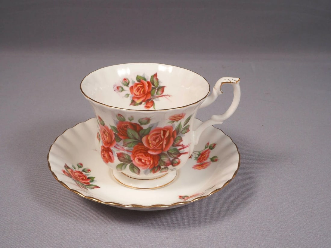 Royal Albert Centennial Roses Coffee Tea Cup Saucer Set Canada: This is a gorgeous Bone China Set of Coffee/Tea cup and Saucer, from the famous Centennial Rose pattern by Royal Albert. This pattern is discontinued. The collection is created to celebrate Canada's c