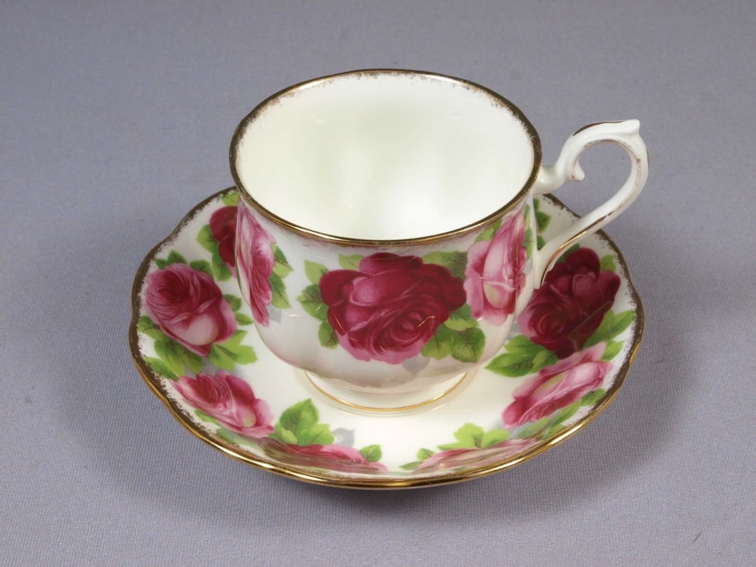 Royal Albert Tea Coffee Cup and Saucer Old English Roses Hampton Shape Vintage: This is a gorgeous Coffee/Tea cup and Saucer set. The set is made by Royal Albert in England in Old English Rose pattern. It is properly marked with Royal Albert Crown China back stamp. The pattern is