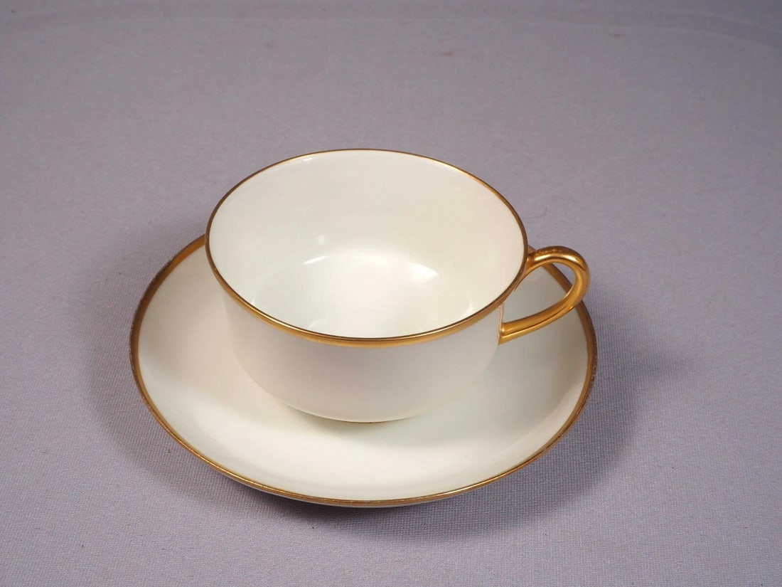 LIMOGES France PL Limoges M. Redon GOLD Coffee Tea Cup Saucer Set: This is a rare and gorgeous set of one Coffee/Tea Cup and Saucer. The set was made in France by M. Redon PL LIMOGES. The set is in very beautiful and features gold band at the rim and the handle of th