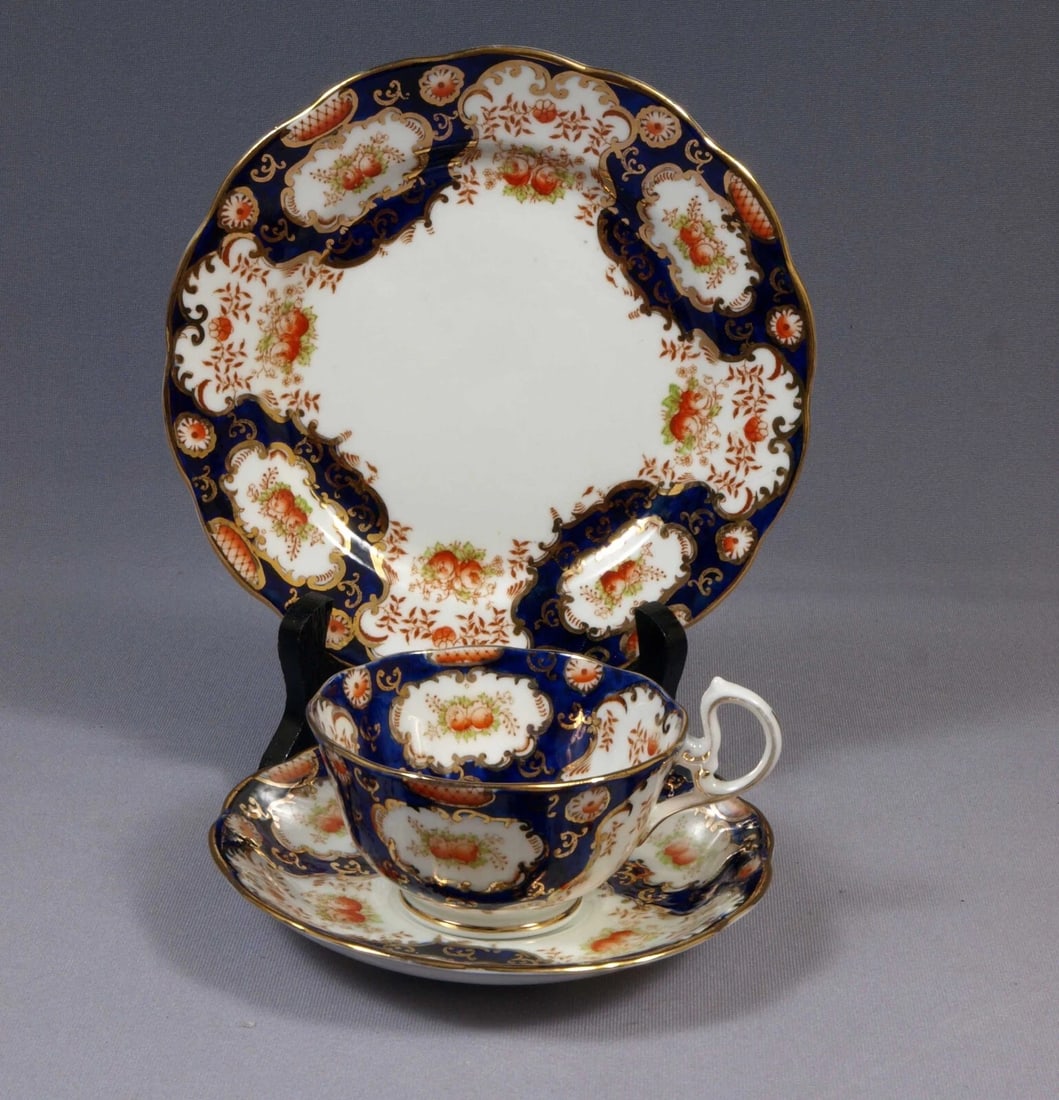 Royal Albert Crown China Heirloom STYILE MARI Coffee Tea cup Saucer Trio COBALT: This is a beautiful and timeless TRIO SET of Tea/Coffee cup, Saucer and a Dessert Plate ; in a rare Unnamed Heirloom Style Pattern, made made by Royal Albert in England. The pattern is a lovely cobalt