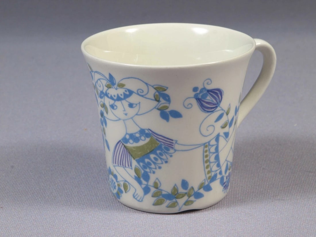 Figgjo Flint Norway Lotte Coffee Tea Cup Mug Turi Design Hand Painted Flower: This is rare and gorgeous Coffee/Tea Cup/Mug Only. The cup was made in Norway by Figgjo Flint in Lotte pattern . The pattern features blue flowers and people. The cup is 3" at the rim and 2 3/4" tall