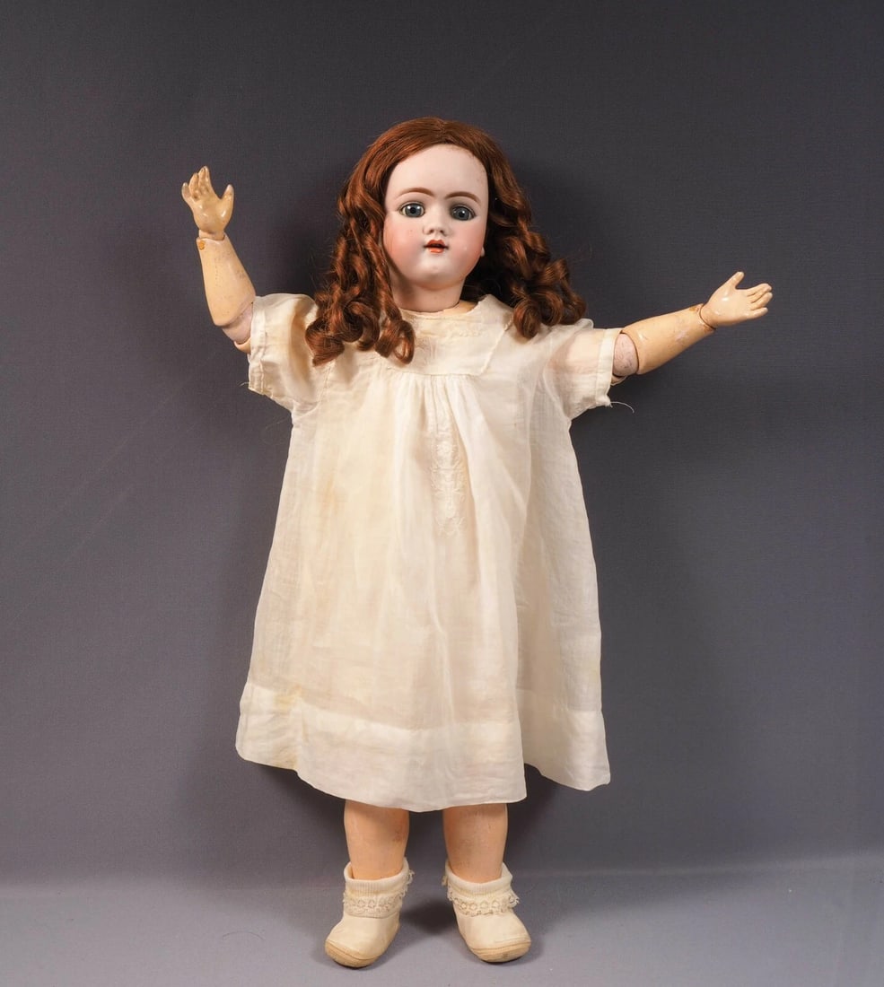 HEINRICH HANDWERCK Doll Germany Bisque Head Composition 26" Antique Marked Body: This is a charming 26" Antique Bisque head/Composition body doll, made in Germany. This is not the usual antique German doll you can find on internet. It is very hard to find a doll made by this Germa