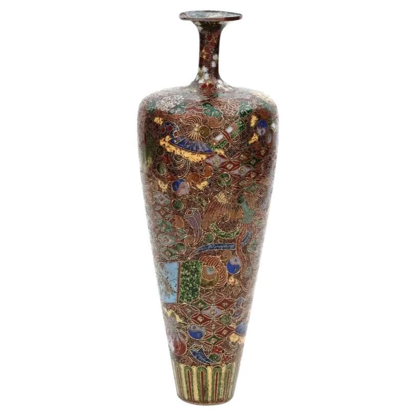 High Quality Antique Meiji Japanese Cloisonne Enamel Vase Kyoto School: About the Item A high quality antique Japanese, late Meiji period, enamel over brass bud vase. The vase has an amphora shaped body and a narrow fluted neck. The ware is enameled with polychrome images