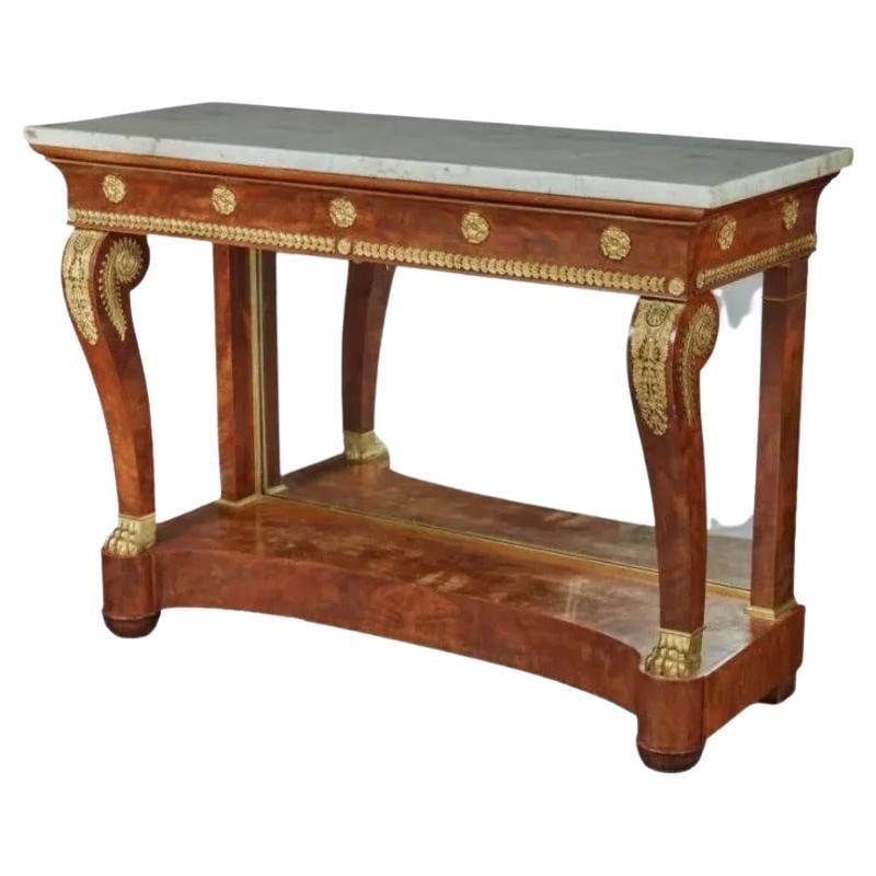 Fine Russian Empire Ormolu-Mounted Mahogany Console Table, circa 1815: About the Item A Fine French Empire Ormolu-Mounted mahogany console table, Circa 1815. With a white marble top and mirrored glass back. Very high quality and delicate French bronze mounts. Very elegan