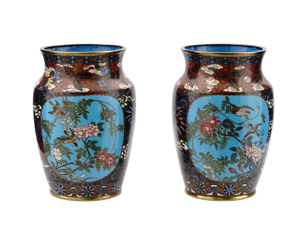 Pair of Japanese Cloisonne Enamel Amphora Shaped Vases: About the Item A pair of high quality Japanese, Meiji era, enamel over brass vases. Each vase has an amphora shaped body and a short wide neck. Each ware is enameled with polychrome medallions depicti