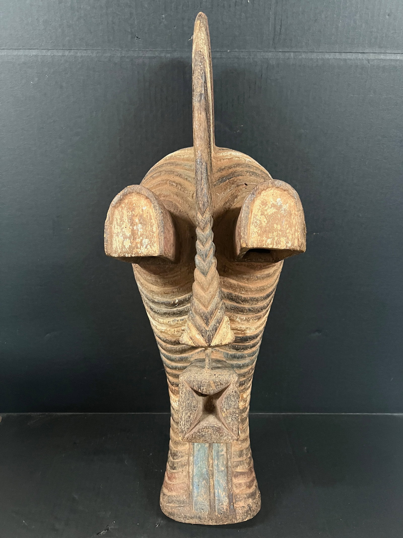 Songye Mask: Title: Songye Mask Date/Period: Late 20th Century Dimension: 22" h x 9" w Material: Wood Additional Information: African Tribal Art Songye Mask Reserve: $150.00 Shipping: Domestic: Flat-rate of $40.00