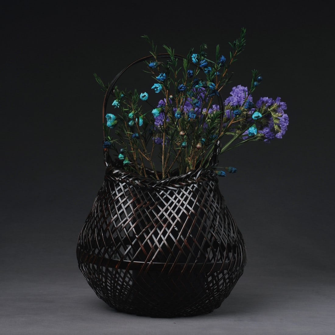 Japanese bamboo woven flower basket: Title:Japanese bamboo woven flower basket Origin:Asian private collection Date/Period:20th C / Materials:bamboo Description:Size: about 18x18x19 cm Japanese exquisite bamboo woven flower baskets. hand