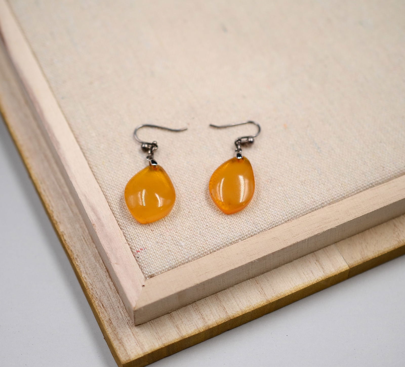 Pair of Tibetan Antique Amber-Silver Earrings: Title:Pair of Tibetan Antique Amber-Silver Earrings Origin:Asian private collection Date/Period:20th Materials:Ambe Description:Size: about 45 mm, antique amber earrings. There are signs of wear, whic