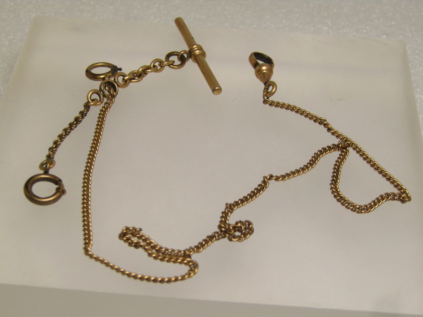 Antique 12kt GF Watch Chain with Bar and Clasps, Signed Keene, 14": Antique 12kt GF Watch Chain with Bar and Clasps, Signed Keene, 14" - estimated 1910's-1920's. This has a 14kt chain that is 1/20 12kt gold filled and marked on t he clip as well as signed Keene. It is
