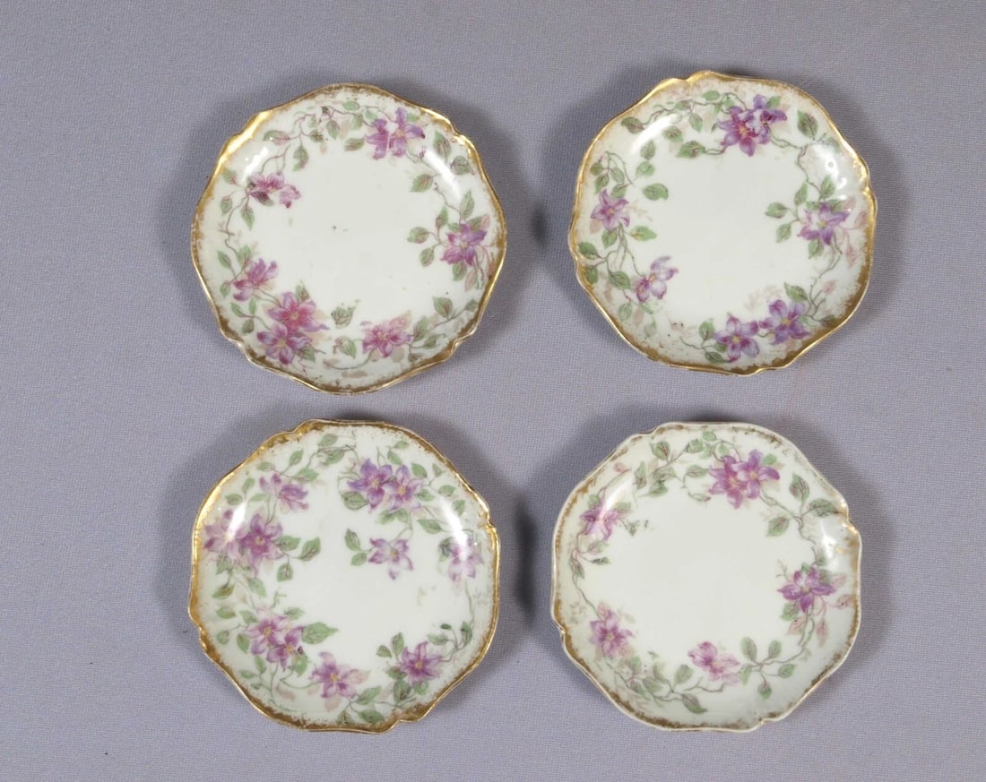 Limoges CHField Haviland GDA France 4 Butter pads Dessert plates Purple Flowers: This is a vintage SET of 4 Butter pads. It is made in CH Field GDA Haviland in Limoges, France. The pads are properly marked with Limoges backstamp They are 3 1/4" in diameter. The set is in good used