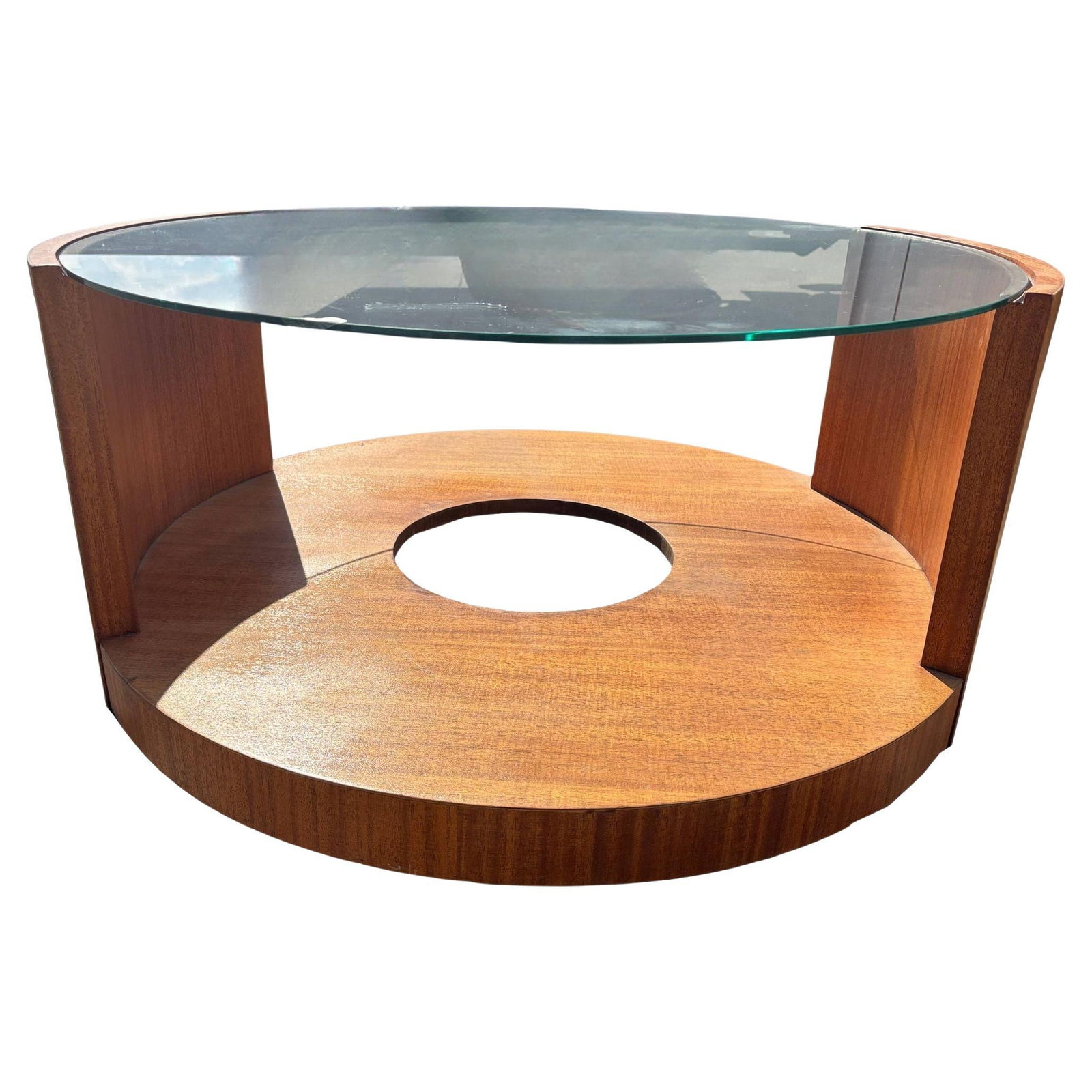 Modernist Mahogany and Glass Coffee or Cocktail Table by Gilbert Rohde: About the Item A sleek Modernist mahogany and glass coffee or cocktail table by Gilbert Rohde showcasing his signature streamlined aesthetic. The rich mahogany frame features clean lines and elegant c